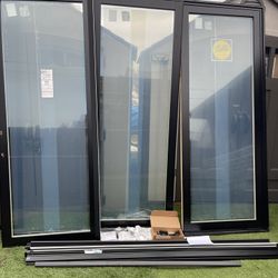 New Patio Door Pella Lifestyle Black Outside Aluminum.  Wood Interior White Size W 105.  H 93.  Scren Lock Included. $2650 