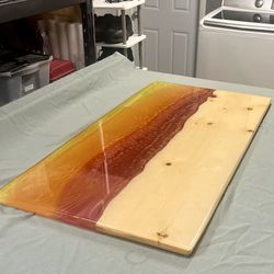 Sunset Toned Epoxy and Wood River Table/Counter