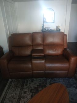Double brown leather couches