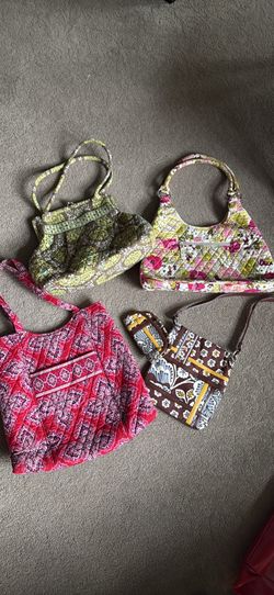 Various Vera Bradley handbags and totes