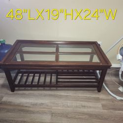Coffee table For you’re Living Room With a Glass Top you Can Also use it However you like  Check Picts For Details 