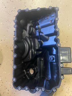 Brand new plastic oil pan with the gasket included, for BMW's