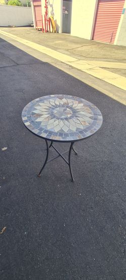 Patio table with stone design