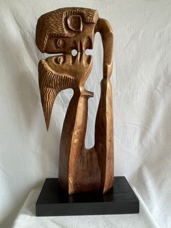 hand carved wood folk art kissing man and woman