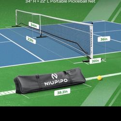 Brand new pickle ball net in the box.