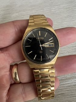 Gold Tone Seiko Watch On Stretch Band