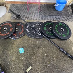 Bench And Barbell With Weights And Clips