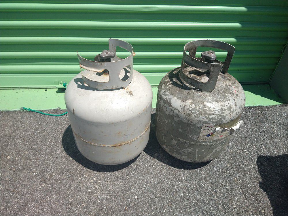 2 empty propane tanks