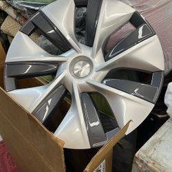 Four Brand New Tesla Hubcaps