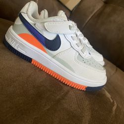 Nike Air Force 1 Low trainers in white and blue