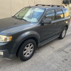 2009. Mazda.    Tribute.    4. Cly. 