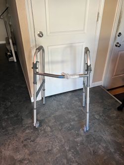 Invacare walker with wheels.