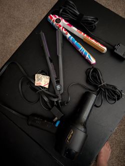 2 hair straighteners & 1 Blow dryer