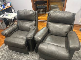 Two reclining leather chairs