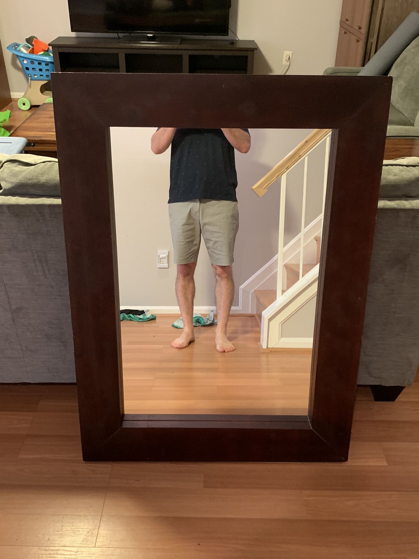 Large mirror with wood frame.
