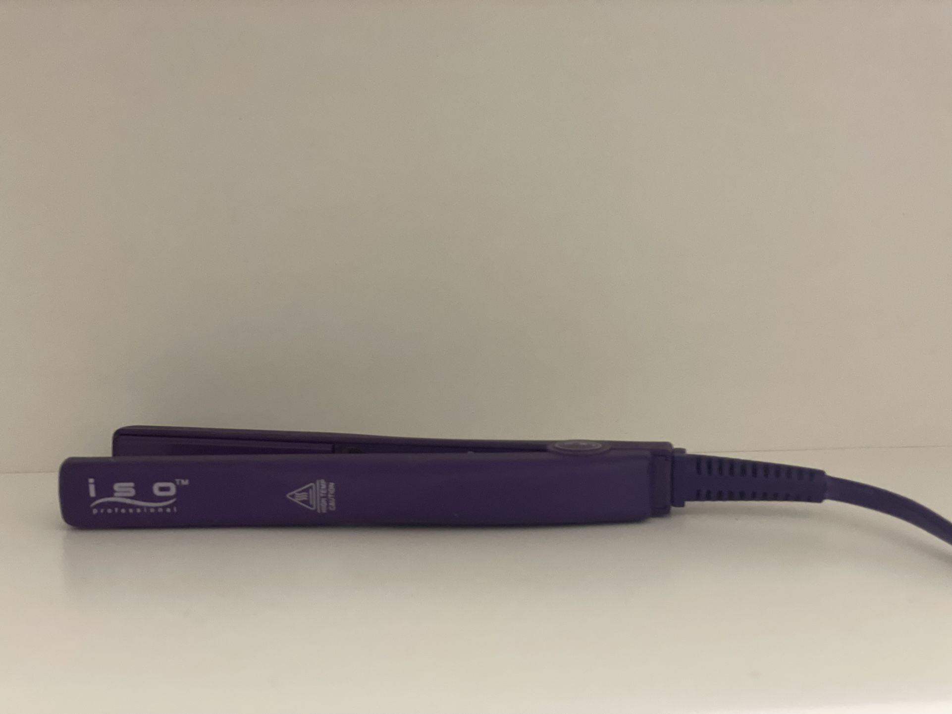 Iso professional Mini Hair Straightener. Straightens short hair or bangs. Heats quickly.