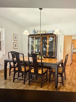 Century Black lacquer dining table and cabinet