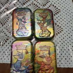 Prismatic Evolutions Pokemon Tins 