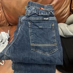 Size Small Jogger Uniform Pants And Size 12 Wrangler Jeans 