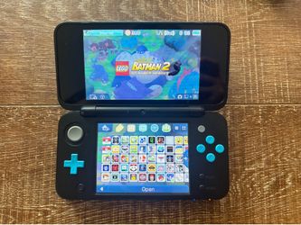 Nintendo New 2DS XL – Good Condition – With Preloaded Software & SD Card