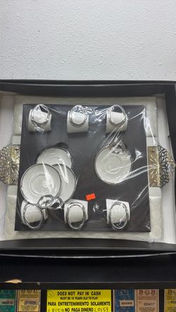 White and Silver Tea Cup and Saucer Set
