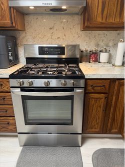 IN WORKING GOOD CONDITION-SAMSUNG FRIDGE, LG RANGE, SAMSUNG DISHWASHER, and OVER THE RANGE HOOD (READ DESCRIPTION)