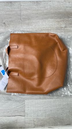 Brown women’s tote with side purse