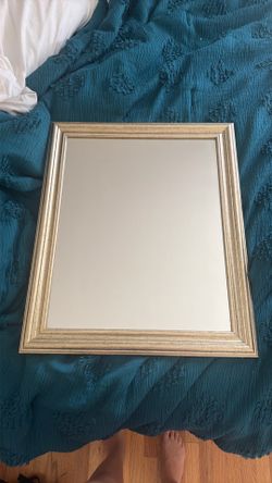 gold hanging mirror