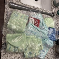 FREE - Shoe Horn, Hospital Grippy Socks, Size 3 Swimmer Diapers. 
