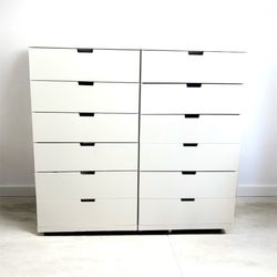 Pair of two tall IKEA Nordli 6-drawer tall dressers in white.