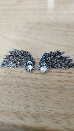 Silver earrings and cuffs