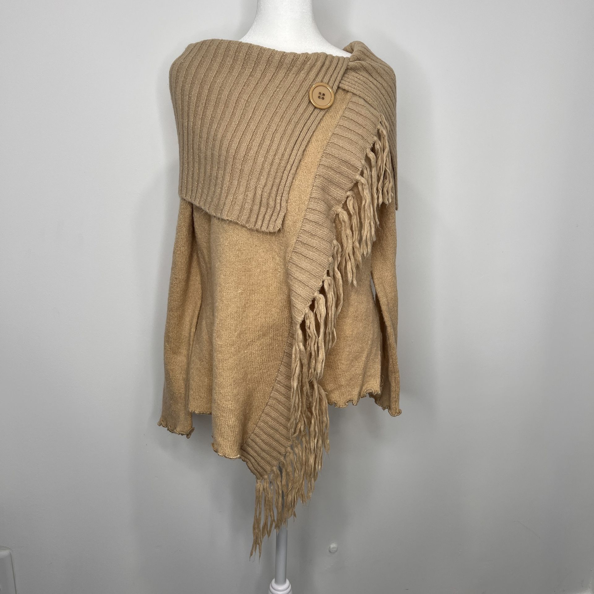 The Bugarri Collection Size 2 Shawl Poncho Cardigan Sweater is a stylish and versatile addition to any woman's wardrobe. Made of a cozy and warm mater