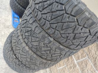 lt285/50r22 nitto ridge grappler tires  10 ply loade range e,  lots of tread only 600.00 for the set must see only remove to upgrade with bigger tires
