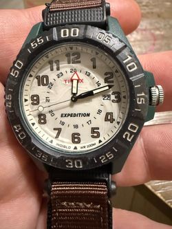 Green Timex watch