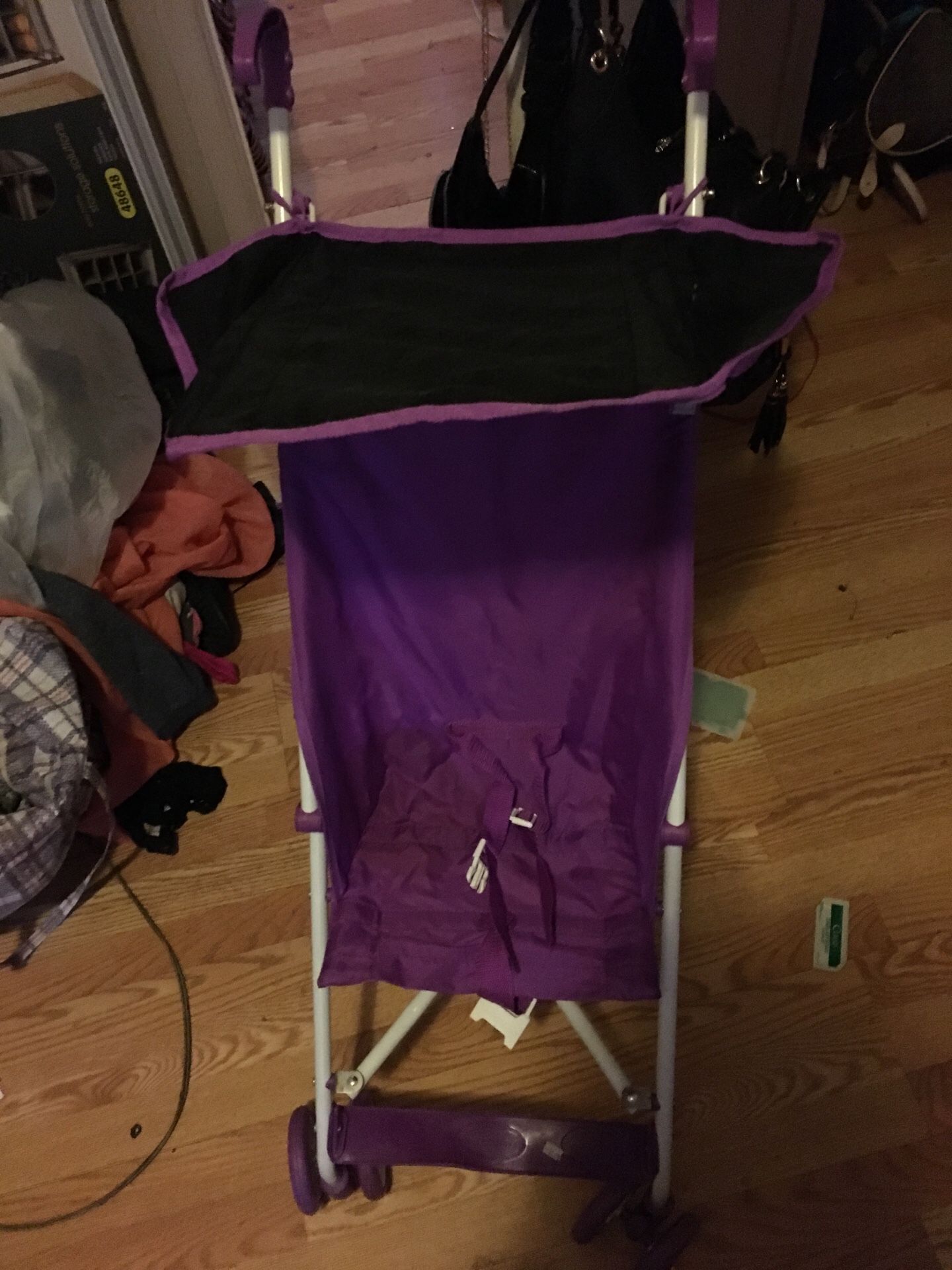 Purple umbrella stroller