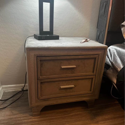 Two gray bedside tables
