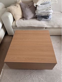 Lift top storage coffee table