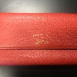 Gucci Pebbled Calfskin Swing Continental Wallet 