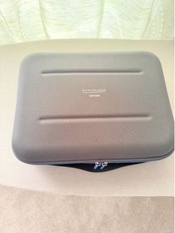 Dream station with compact travel case and hose