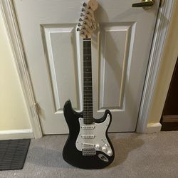 Black and white electric guitar