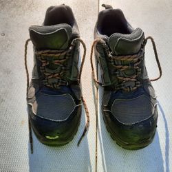 Red wing work boots with steel toe.