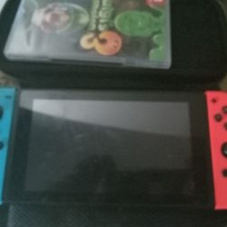 Nintendo Switch With Case And Luigis Mansion 3