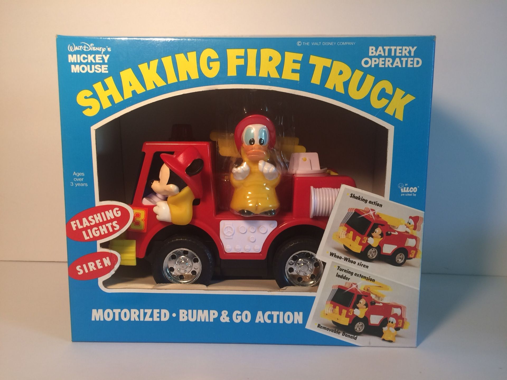 Vintage Walt-Disney Mickey-Mouse Shaking Fire Truck