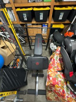 Multiple functioning bench press, preacher curl, leg curl machine