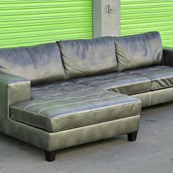 Grey Leather Sectional Couch / Good Condition/ Delivery Negotiable 