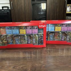 Pokemon TCG Prismatic Evolutions Mini Tins.