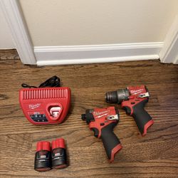 M12 Milwaukee Fuel impact driver & drill with (2) 1.5Ah battery and charger