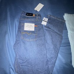 pair  of 7 jeans size 14