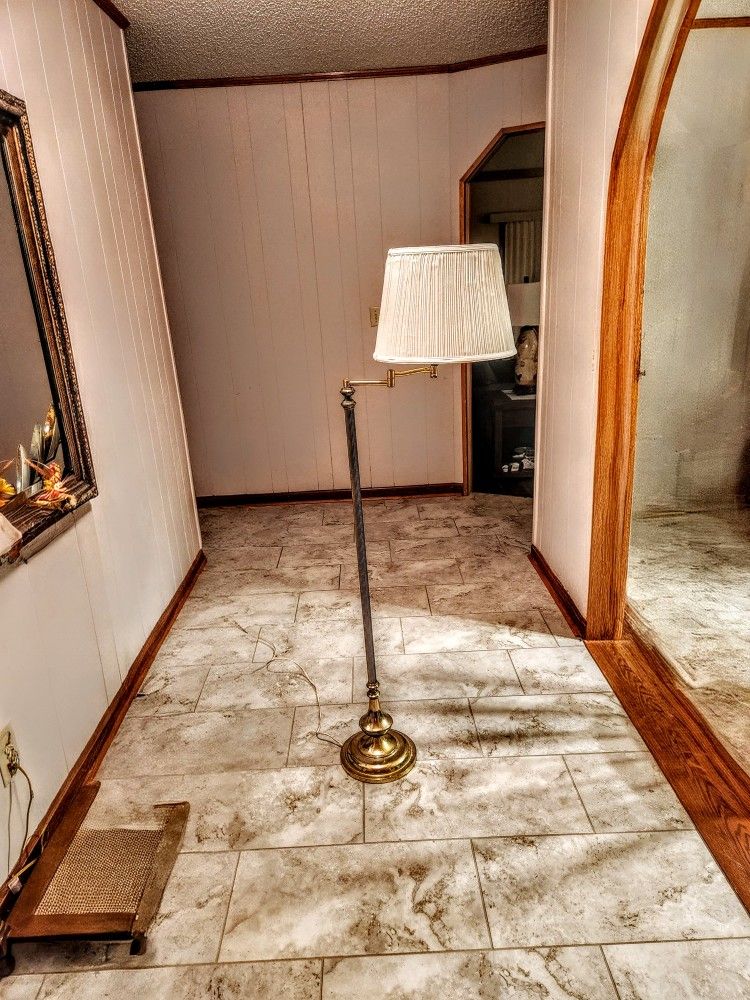 Gold-Colored Floor Lamp With Off-White Shade
