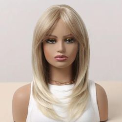Human hair blend platinum blonde ombre layered wave wig.